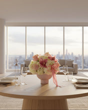 Load image into Gallery viewer, Floral arrangement with pink and white flowers tied with a pink ribbon.