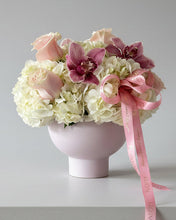 Load image into Gallery viewer, Floral arrangement with pink and white flowers tied with a pink ribbon.