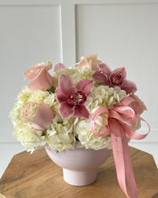 Load image into Gallery viewer, Floral arrangement with pink and white flowers tied with a pink ribbon.
